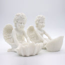 Porcelana De Pareja De Conejos Con Flores En Piedra