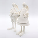 Figura En Piedra Molida De Pareja De Conejos Con Flores